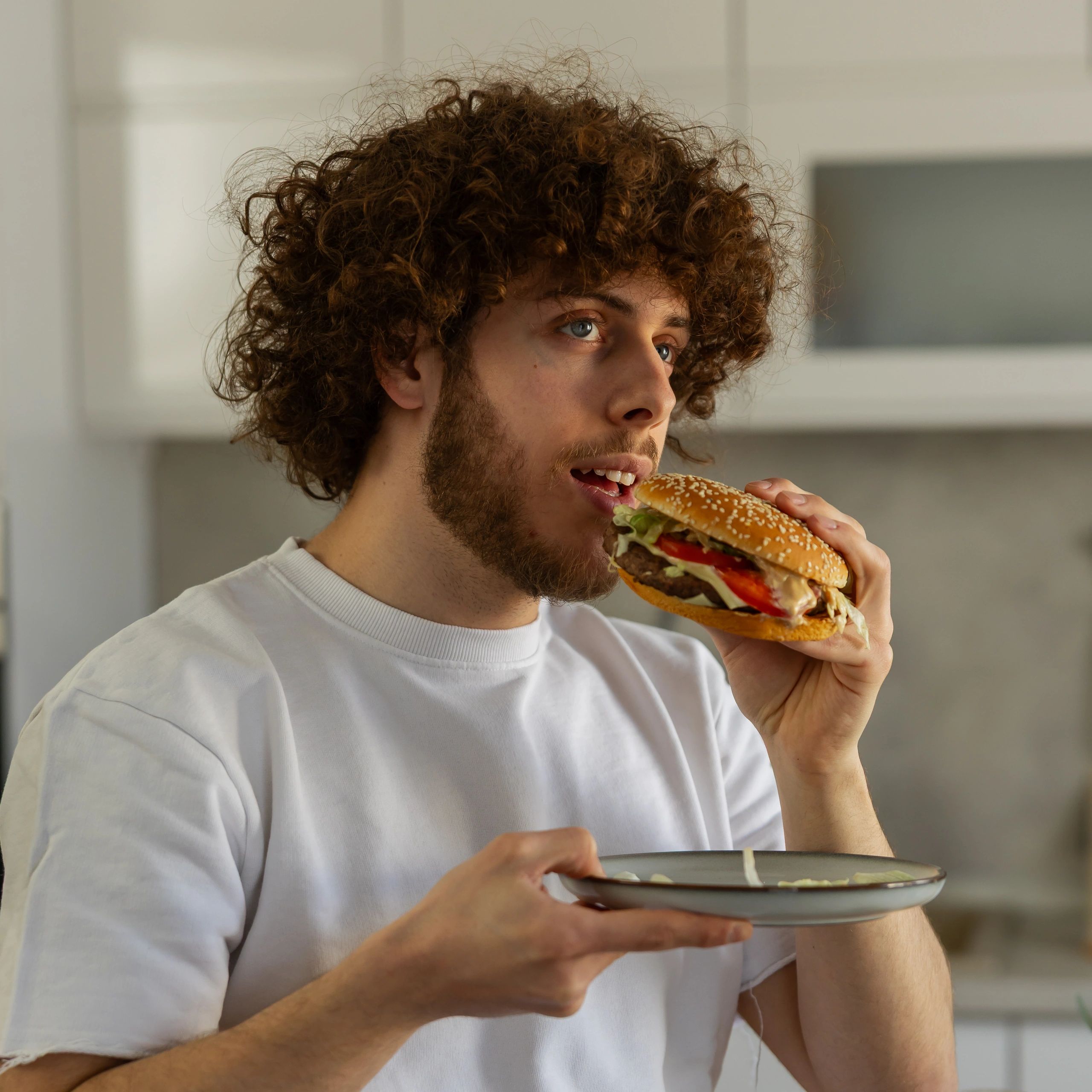 Smiling burger customer in a casual setting
